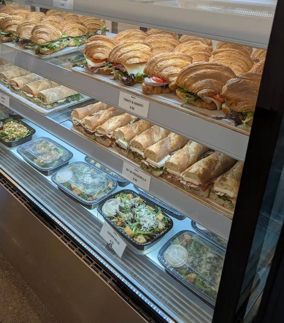 Croissant sandwiches and salads in the case at Bonrue Bakery