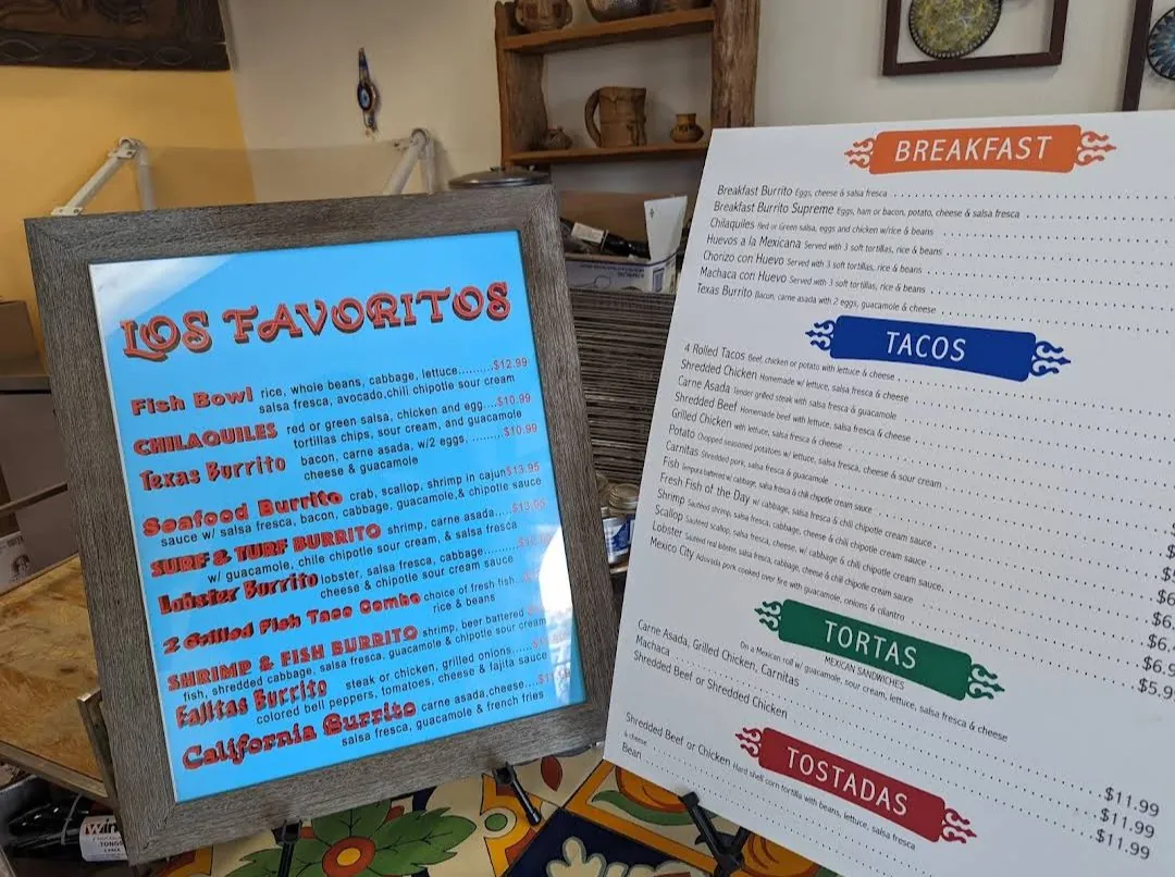 Los Favoritos and taco menu boards at Mi Ranchito